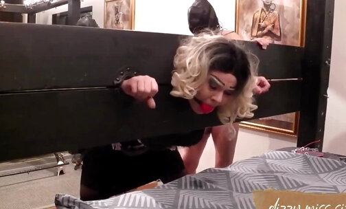 Dizzy Miss Sizzy is gagged and put in the stocks