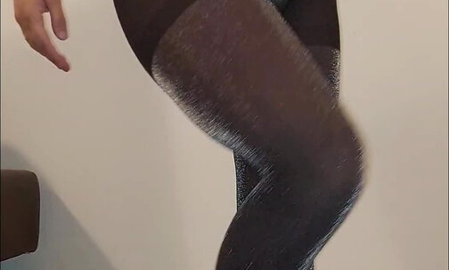 Sexy tease in shiny pantyhose and panties