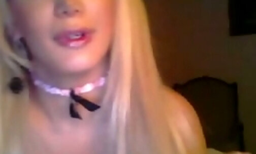 Very cute blonde tranny on cam