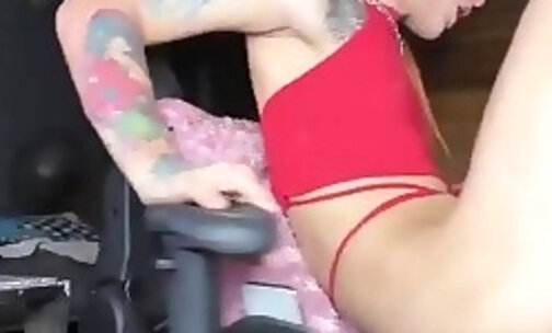 tattooed tgirl from Venezuela tugs her big cock online