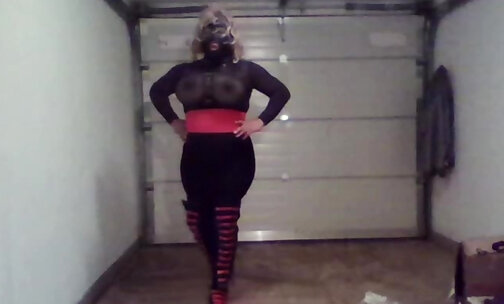 Crossdresser with black and pink boots