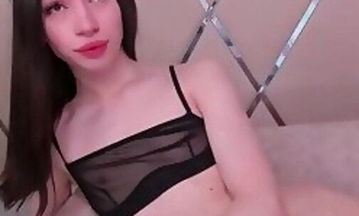 slim teen transgirl in stockings strokes her big dick on webcam
