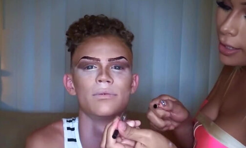 She doing her boyfriend's makeup