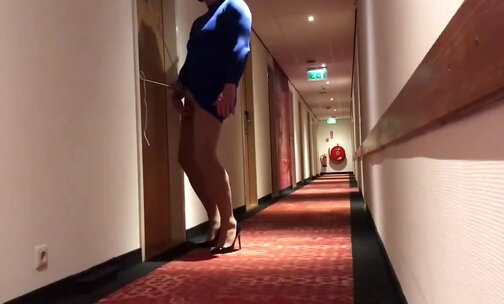 Crossdresser Selfbondage in hotel corridor and caught
