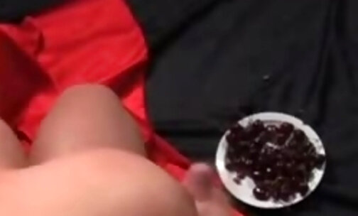 Tranny jerks off and eats creamed cherries