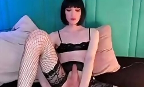 skinny transgirl in fishnet stockings strokes her big sheshaft on webcam