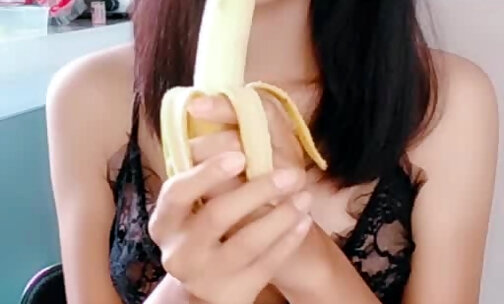 Ladyboy Meena Enjoying a Banana