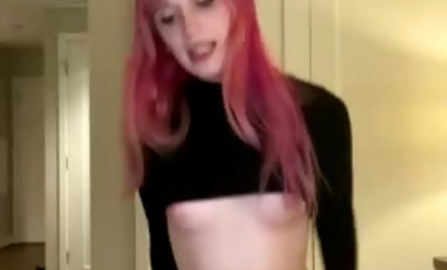 Cute pink haired teen riding on top