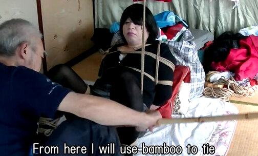 Erotic panties of jyosoukofujiko bound with rope and bamboo to uncle