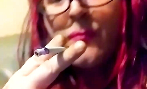 Chloe giving a Black Dildo a Smoking Blowjob