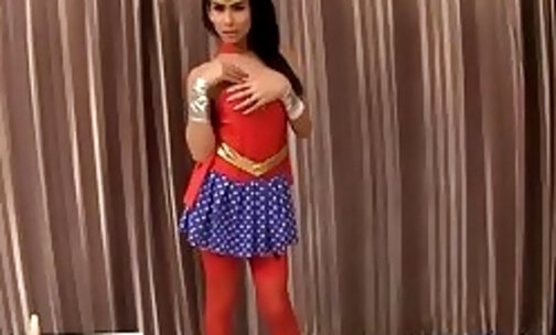 Wonder shemale slut Gor self ass fucking after posing in superhero costume