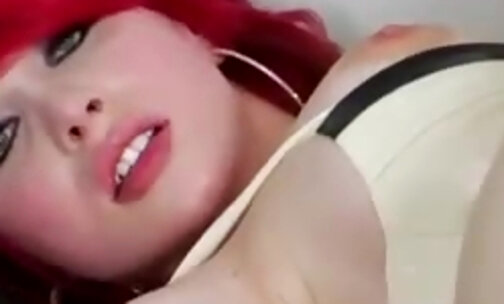 This super vampy redhead shemale is a real goddess