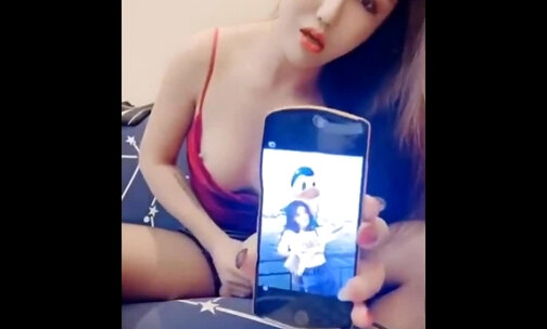 Asian Ladyboy Masturbating and Cumming on her Cellphone