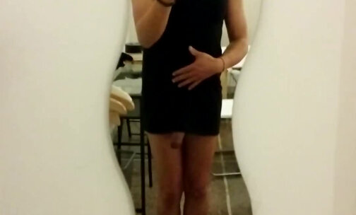 Teen beauty crossdresser in black dress with a big load